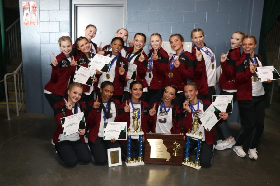 After placing 1st in jazz, pom, and overall, the Silver Stars display their awards. The girls defended their title as State champions on Feb. 26. 