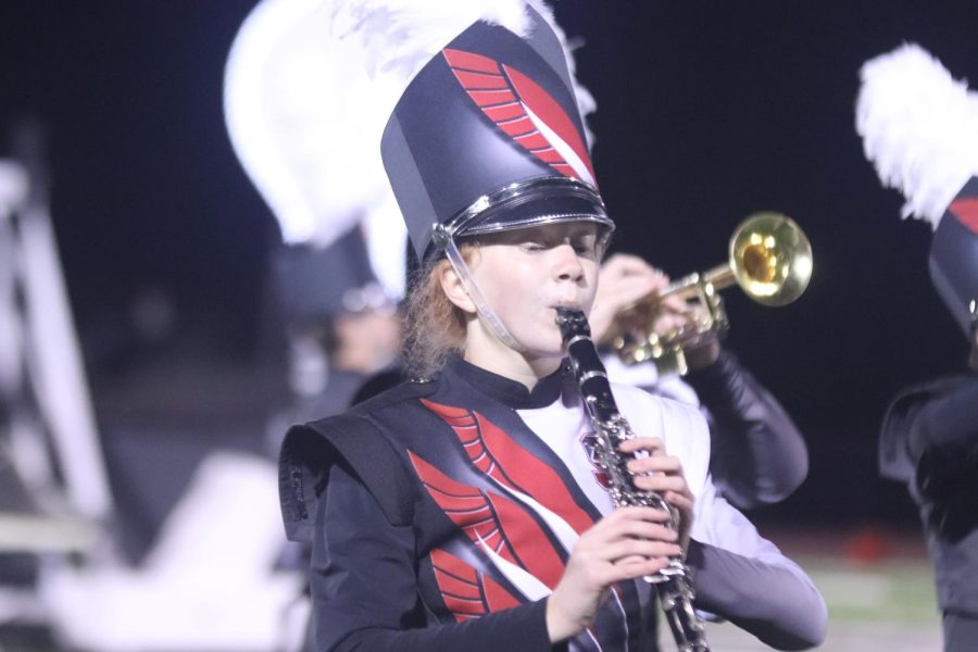 Sophomore Madeline Kelly
plays clarinet at the bands
halftime performance for the Homecoming game on Sept. 30. This year, the theme for the bands performance was Age of Invention, and it covered how technology has changed and advanced over time. 