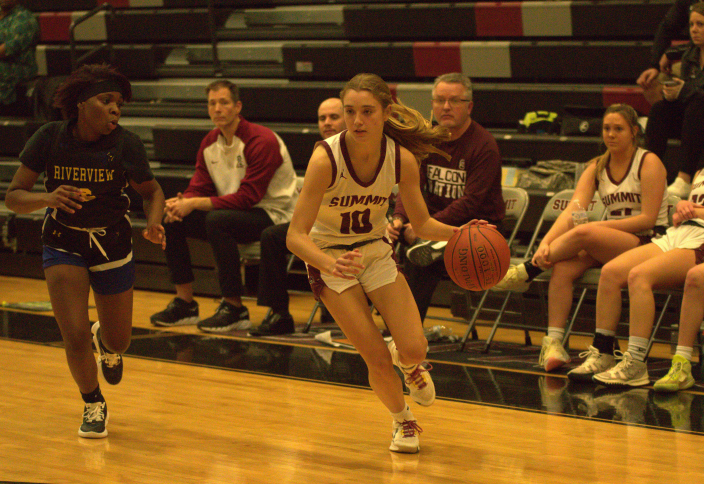Junior Cece Hoeflinger drives into the paint against Riverview Gardens on Jan. 19. The Falcons beat the Reams 57-8. 