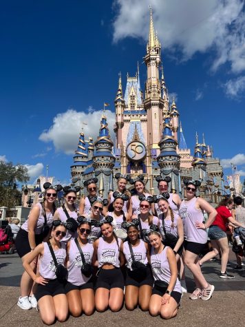 The Silver Stars gather in front of Cinderella’s castle at Disney World. The dance team competed in the National competition in Orlando, Florida. (Photo used with permission by Erin Taylor)