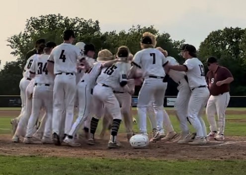 The Falcons celebrated a walkoff home run by senior Zach Liggett, defeating the Ladue Rams 3-1. Liggett was down to his final strike before sending the ball over the center field fence on May 17. (Photo used with permission by Vanessa Metz)
