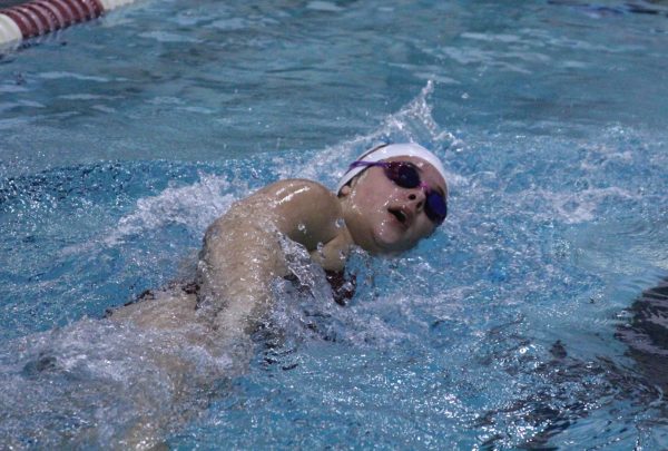 Freshman Ayda Demerit comes up for a breath during her freestyle
lap. Her relay placed fourth in the 400 free. The meet took place on
Jan. 11.