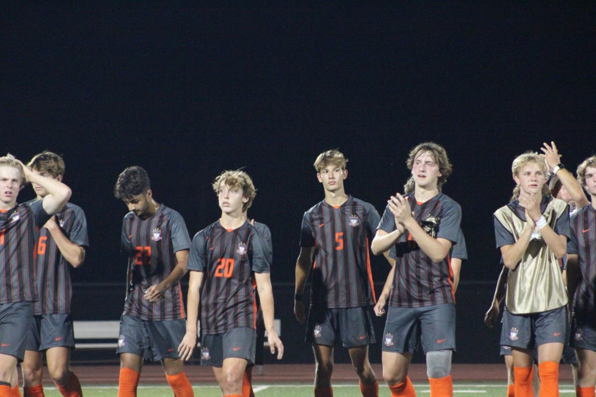 Soccer celebrates their win against Marquette. Summit won 2-0.