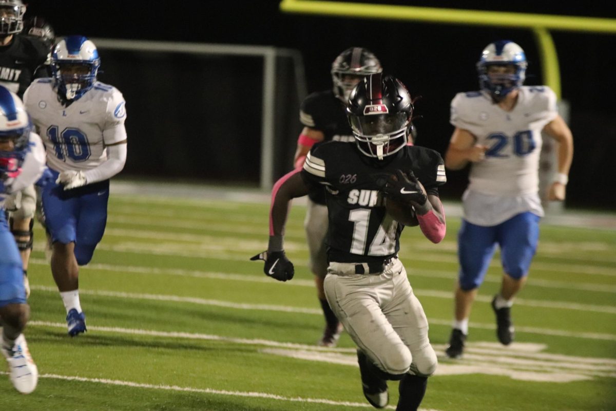 Sophmore Kindall Young runs to his teammates in an attempt to capture the ball.