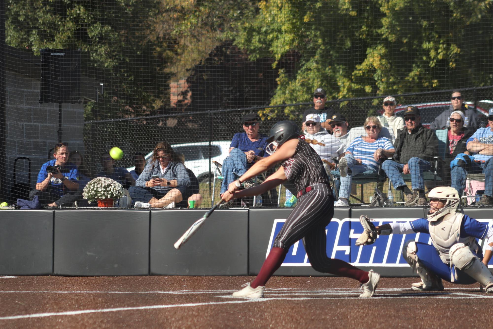 Softball wins round one of districts 5-4 in tight game with Washington Bluejays