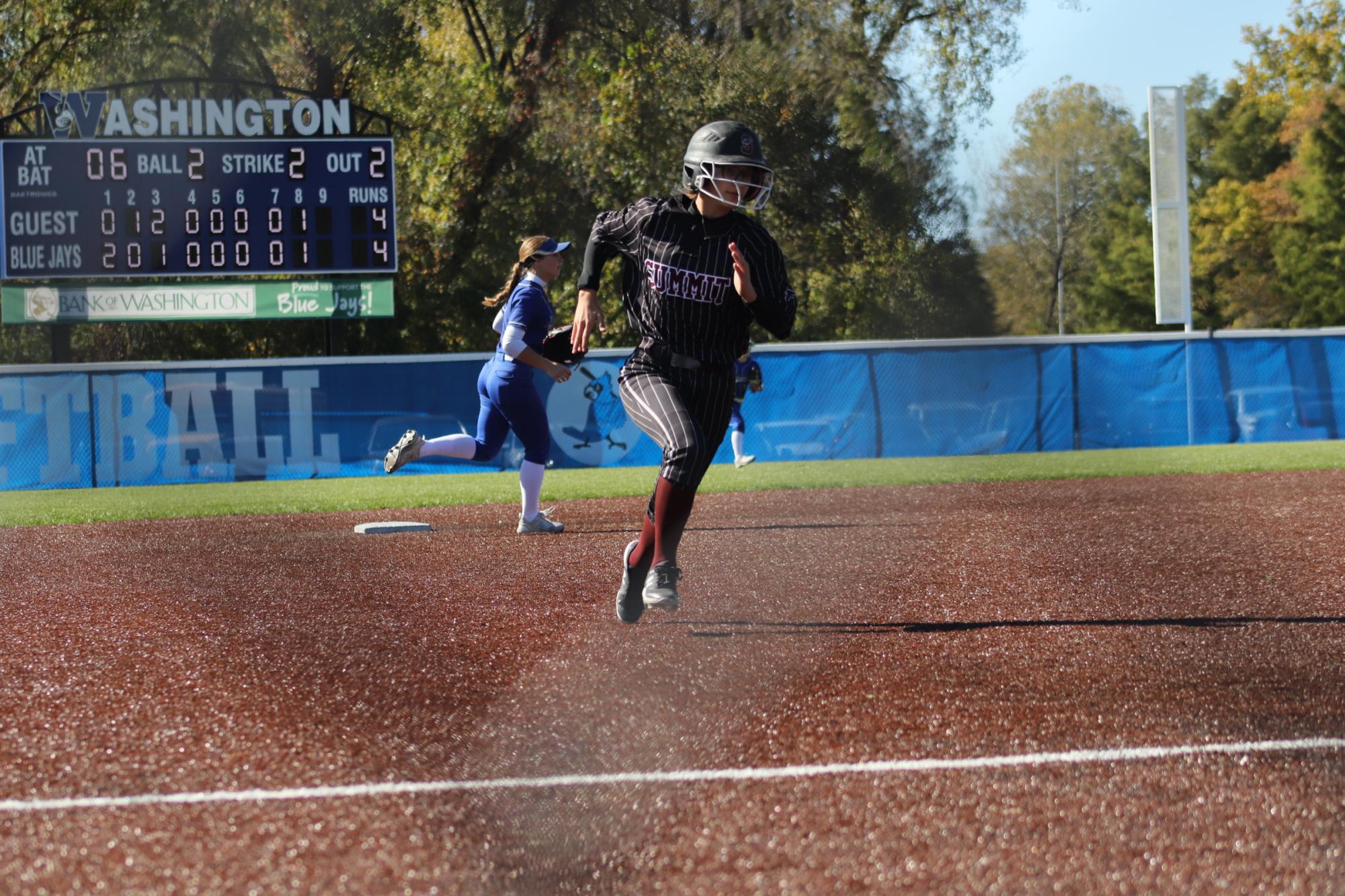 Softball wins round one of districts 5-4 in tight game with Washington Bluejays