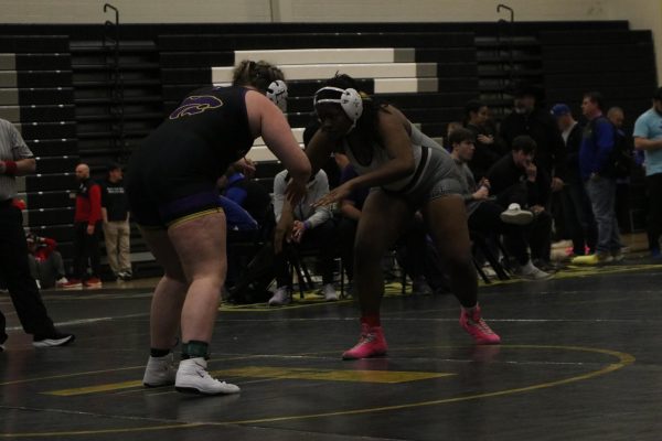 Junior Kamauri Fowler measures up Eureka's Addison Neumann at the District Tournament on Feb 15. Fowler would beat Neumann 3-1, but fall in the next round to Ella Kimbrough of Lafayette 2-4.