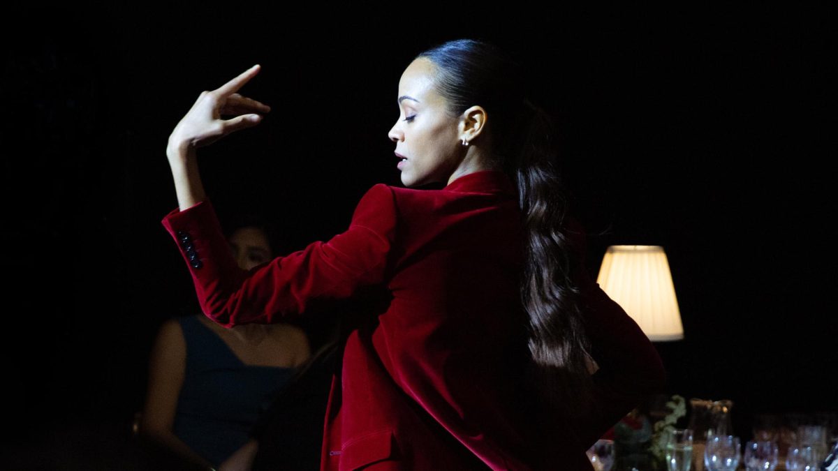 Zoe Saldaña as Rita Mora Castro dancing in the song "El Mal" from Emilia Pérez. (photo from the New York TImes)