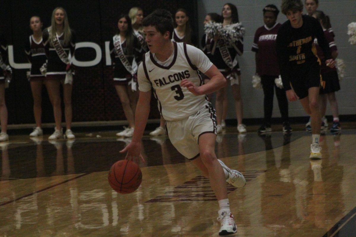 Running down the court, sophomore Bradley Wyatt heads to the basket. The Falcons were defeated 39-56 by the Lutheran South Lancers.