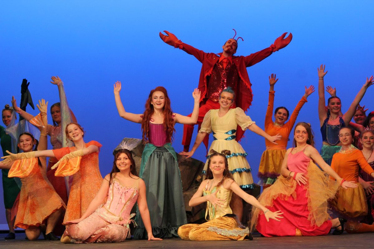 The cast of the Falcon Players' production of The Little Mermaid performs "Under the Sea" during dress rehearsal. The musical took place Mar. 6-8 in the auditorium.