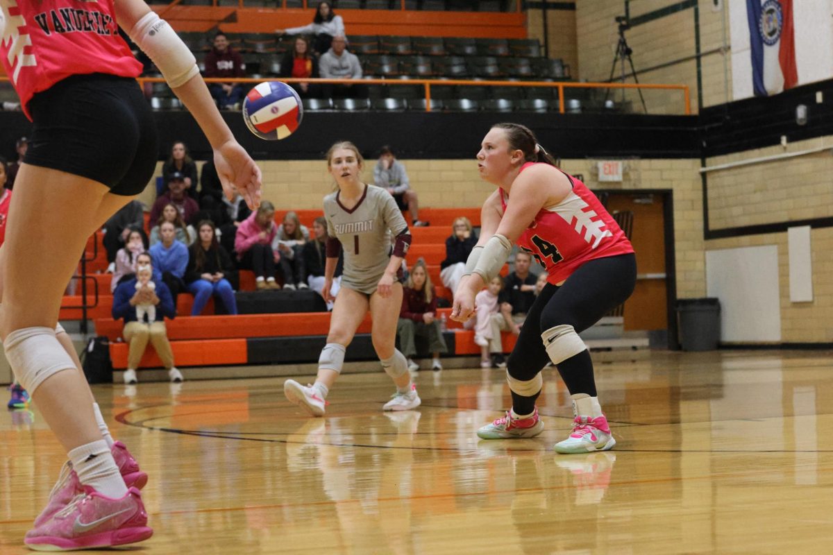 Receiving the ball, freshman Mackenzie Pancer bumps the ball to her teammate. The Falcons set a new school record this season with 26 wins.