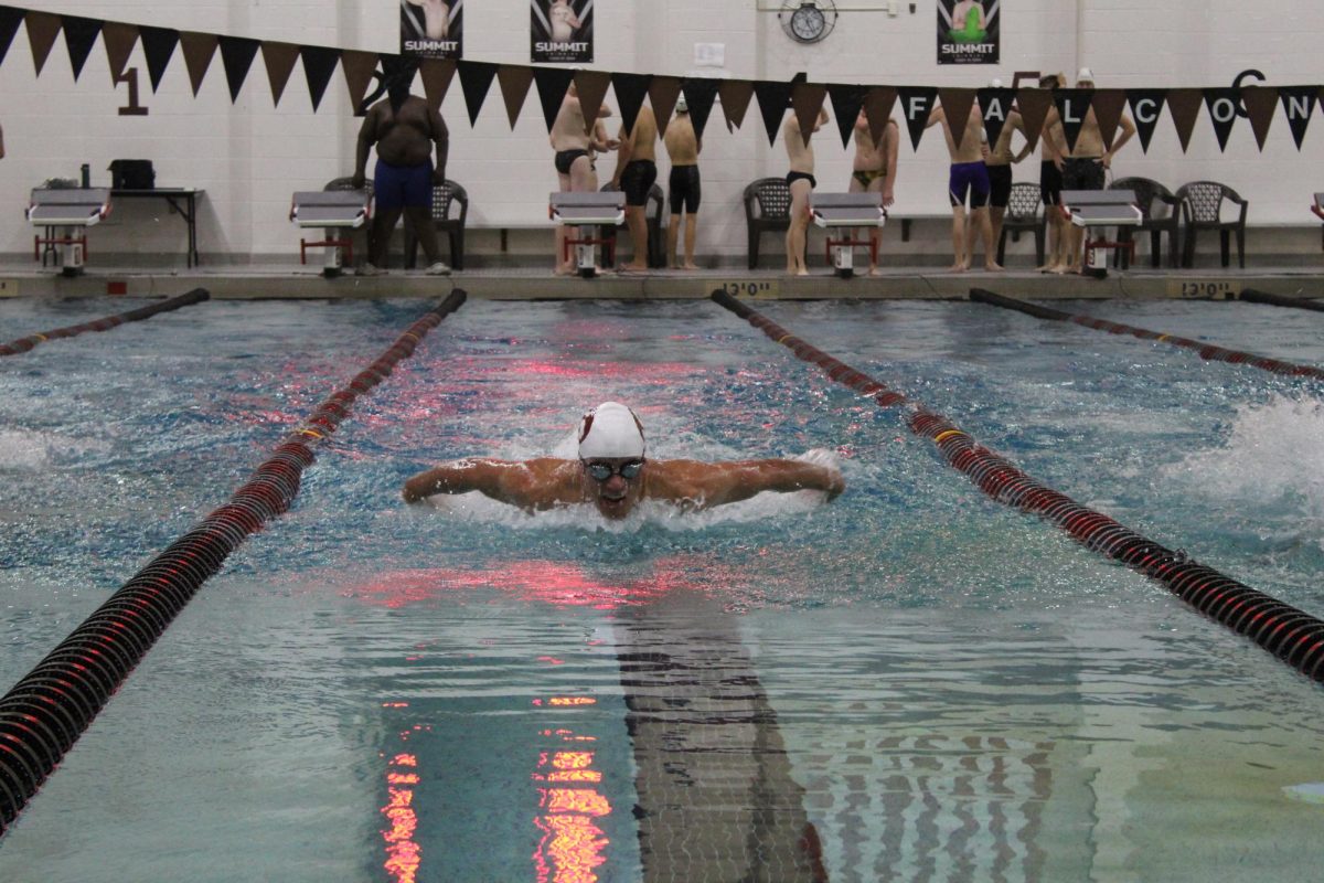 Swimming against Christian Brothers College, junior Caleb Hardee does the butterfly stroke. The swim meet took place on Oct. 6, and Summit lost 119-66. 

