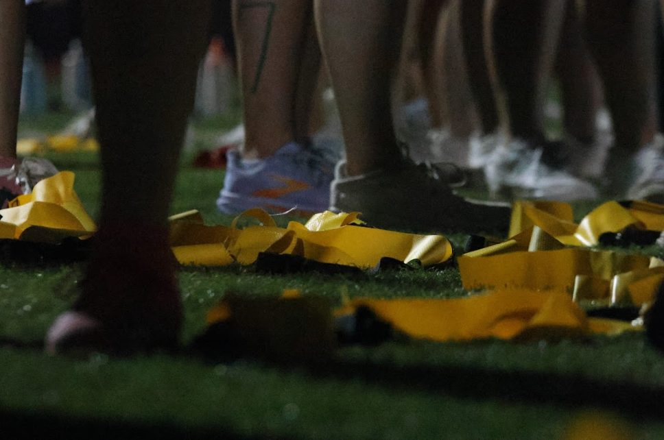 The juniors' flags sit on the ground after rules were changed from flag football to two-touch. This was the first time this change has ever occurred.