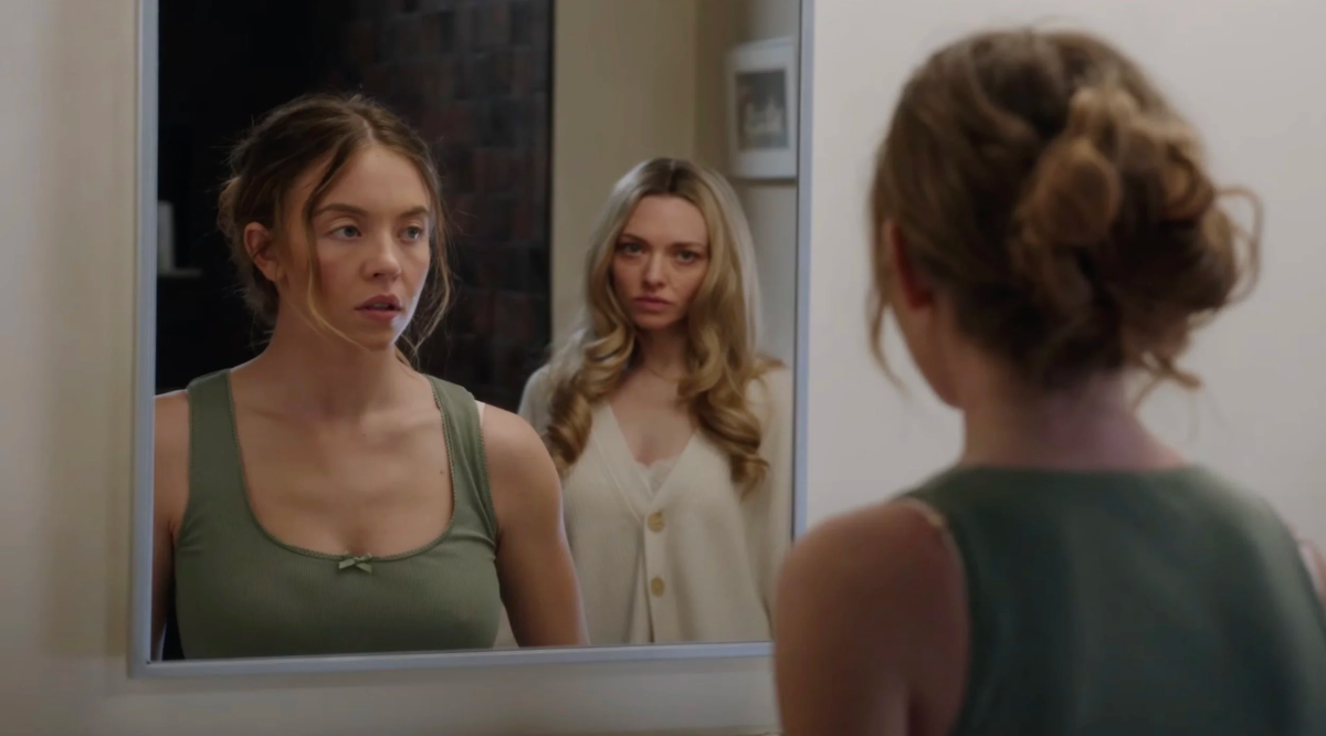 Millie Calloway, played by Sydney Sweeney, sees Nina Winchester (Amanda Seyfried) staring at her through the mirror. (photo from The Today Show)