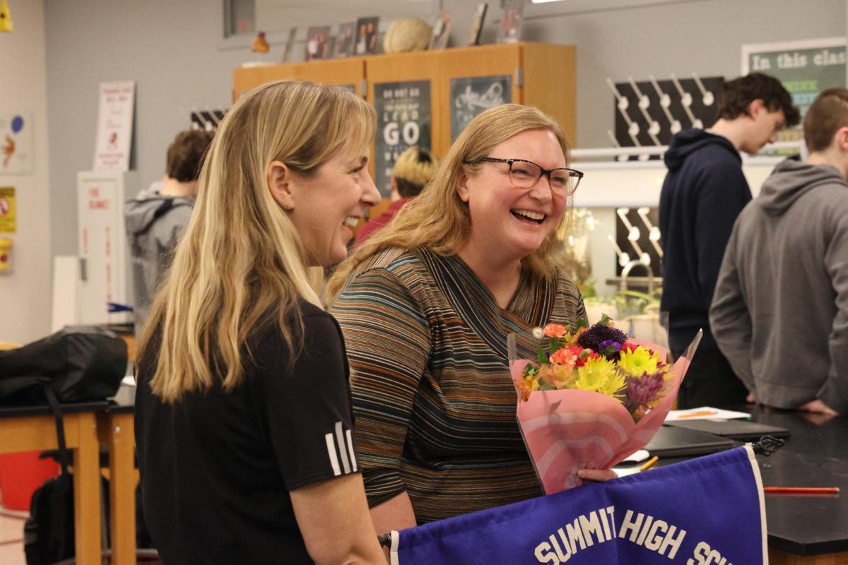 Teacher of the Year winner Sarah Moonier laughs with building principal Dr. Emily McCown after winning the award. This marks Moonier's second Teacher of the Year award, her first one being awarded to her in the 2013-2014 school year.
