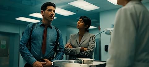 Detectives Jack and Priya talk to the coroner as they investigate a murder case. “His & Hers” can be found on Netflix. (photo from IMDb)
